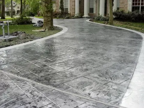 Stamped concrete driveway.