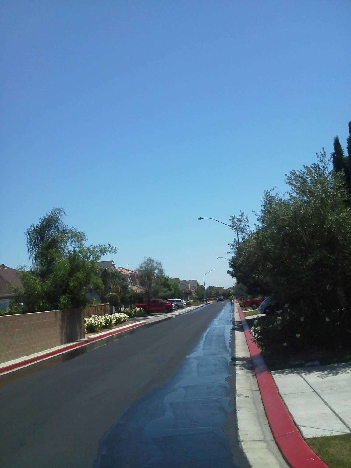 Neighborhood street freshly sealed.